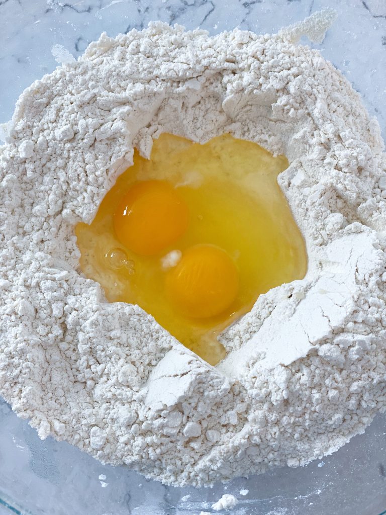 make a well with flour and egg