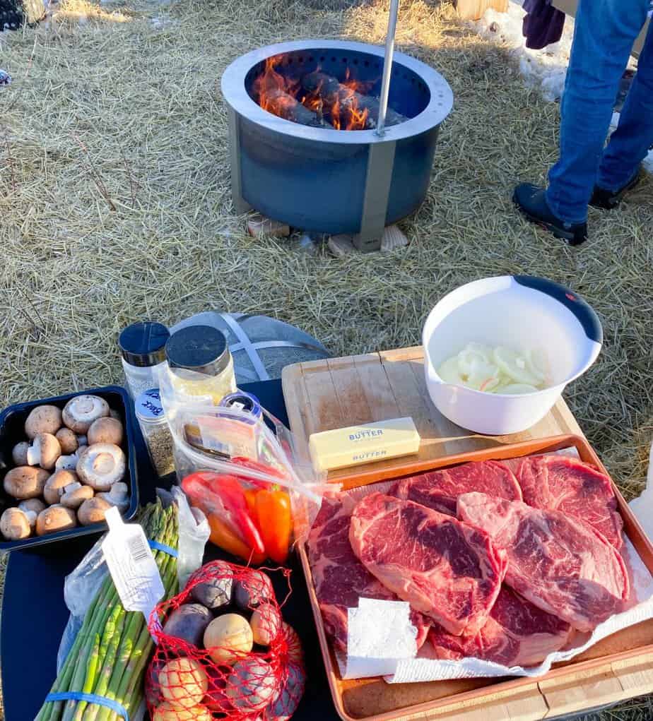 grilling food over open fire