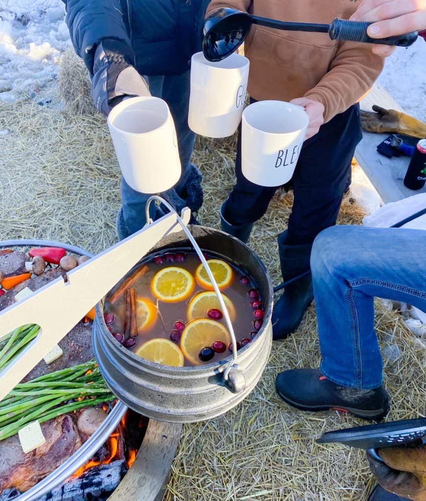 mulled apple cider over fire